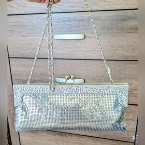 Silver metal Cache Purse New w/Tags Interior in pearl grey fabric. Rare